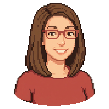 Maya, wearing red glasses and a red top